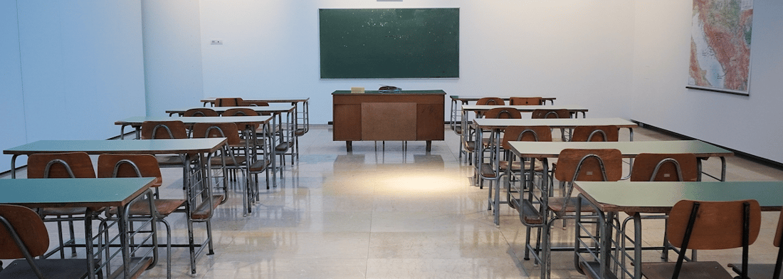 empty classroom with chalkboard