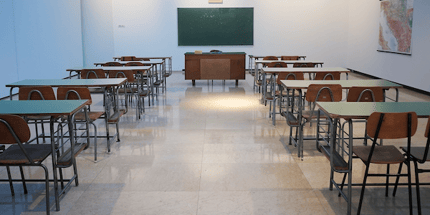 empty classroom with chalkboard