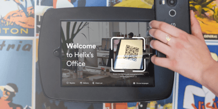 Proxyclick Touchless Check-In QR code scanning on front desk kiosk